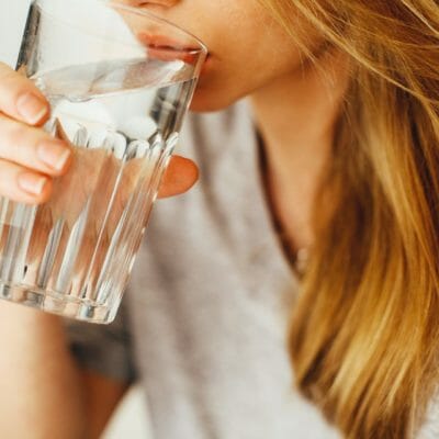 Woman drinking a glass of water